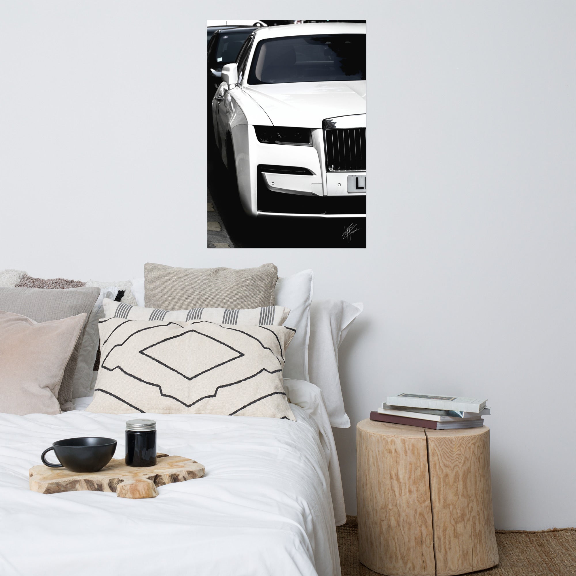 Photographie en noir et blanc de la luxueuse Rolls-Royce Ghost.