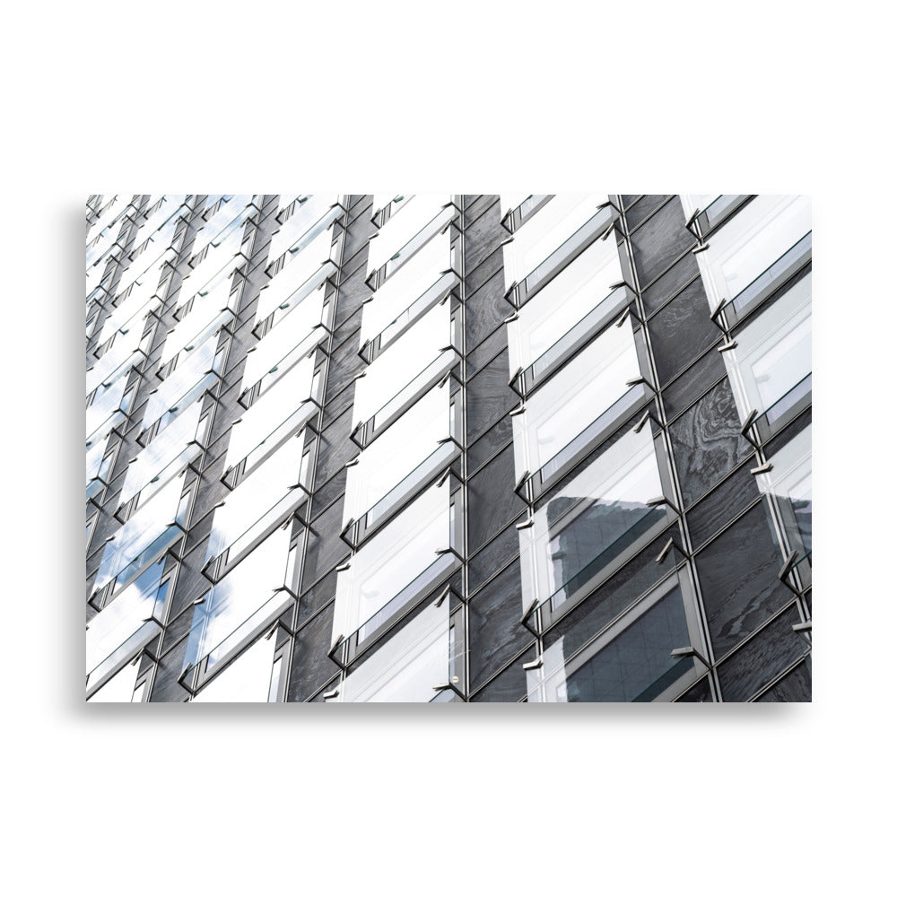 Photographie architecturale 'Jeu d'échecs', capturant des façades vitrées dans un jeu de réflexions et de symétrie.
